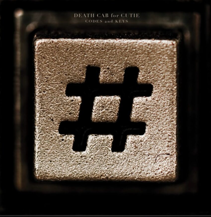 Death Cab for Cutie's 2011 album "Codes and Keys" with a pound sign/hash tag on the cover from an old pay phone.