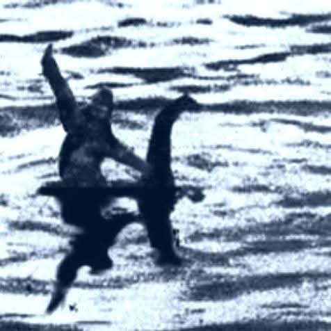 Bigfoot riding the Loch Ness Monster flipping the camera off!