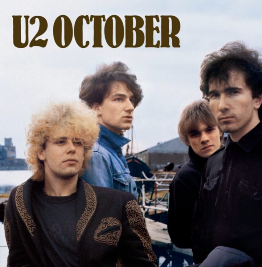 Cover the U2's 1981 album October featuring all of the 4 members of the band on it.