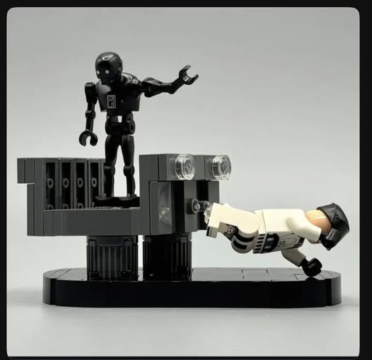 LEGO diorama scene from Andor when K2-S0 threw the Imperial trooper off the brige.