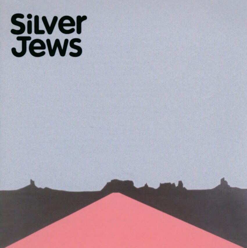 Cover art of Silver Jews' 1998 album "American Water". A minimalist road going into the background into minimalist hills and mountains.