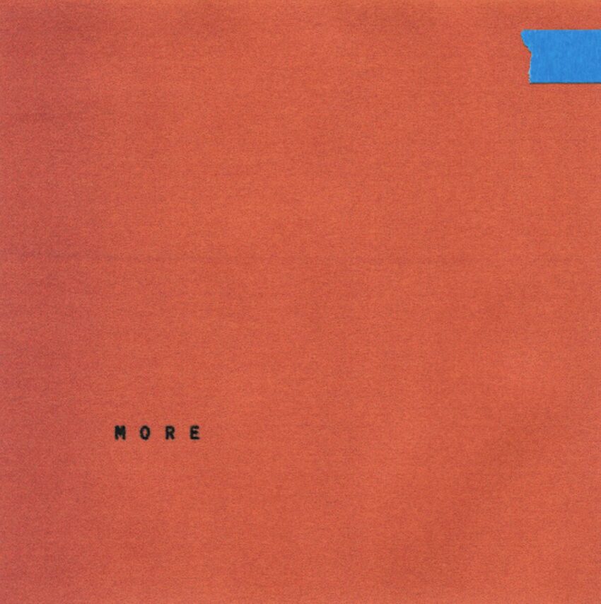 Cover art of Wallows's 2025 album "More". Orange cover. Small blue tape on top-right side of cover. Text that says MORE on bottom left.