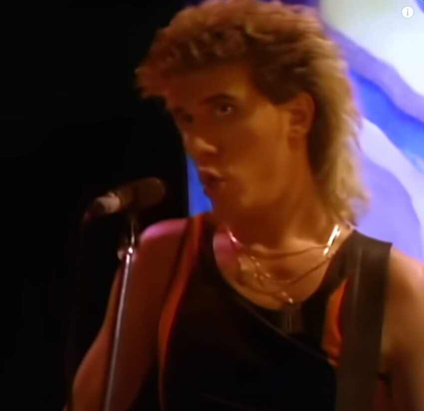 Still from the music video from The Outfield's 1985 song "Your Love"