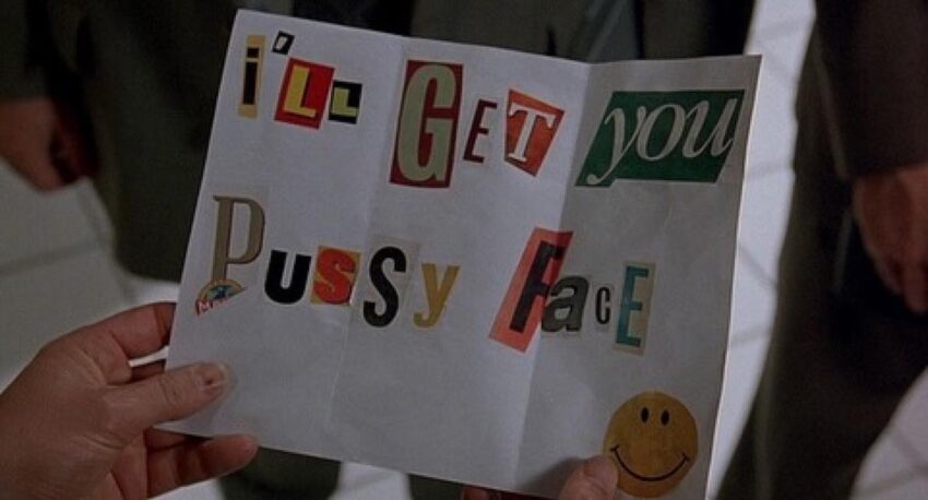 Still image from Jon Waters' film "Serial Mom" of the note that reads "I'll get your pussy face" with a smiley face at the bottom right.