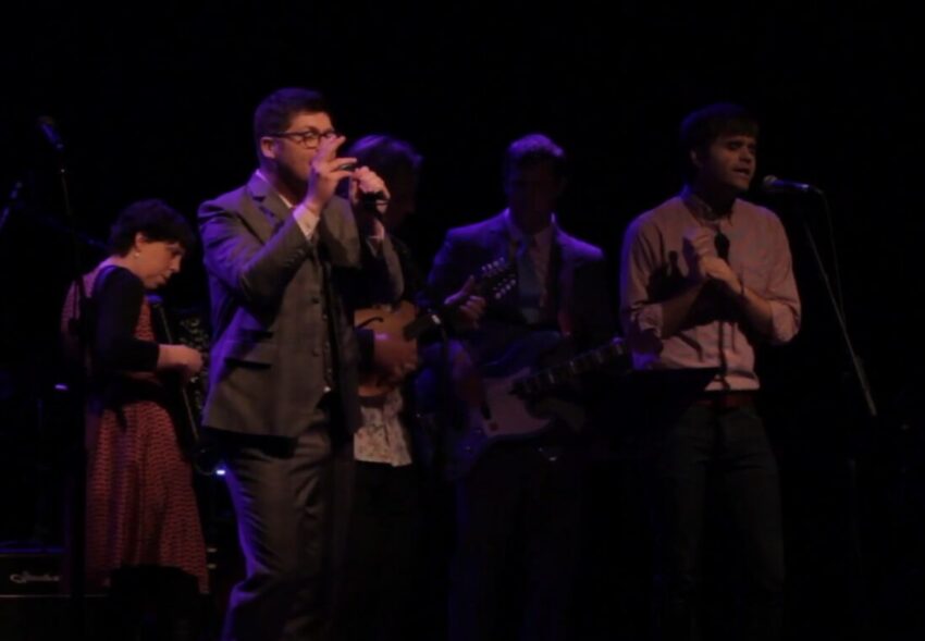 Video still from The Decemberists and Ben Gibbard covering R.E.M.'S "You Are The Everything" - Filmed at John Wesley Harding's Cabinet of Wonders, a benefit for JoyRx Music in Portland, OR.